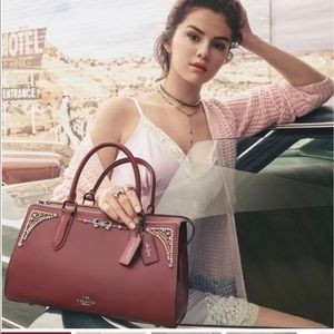 🤩Authentic Leather Coach Bag X Selena Gomez in wine color with lovely crystals.